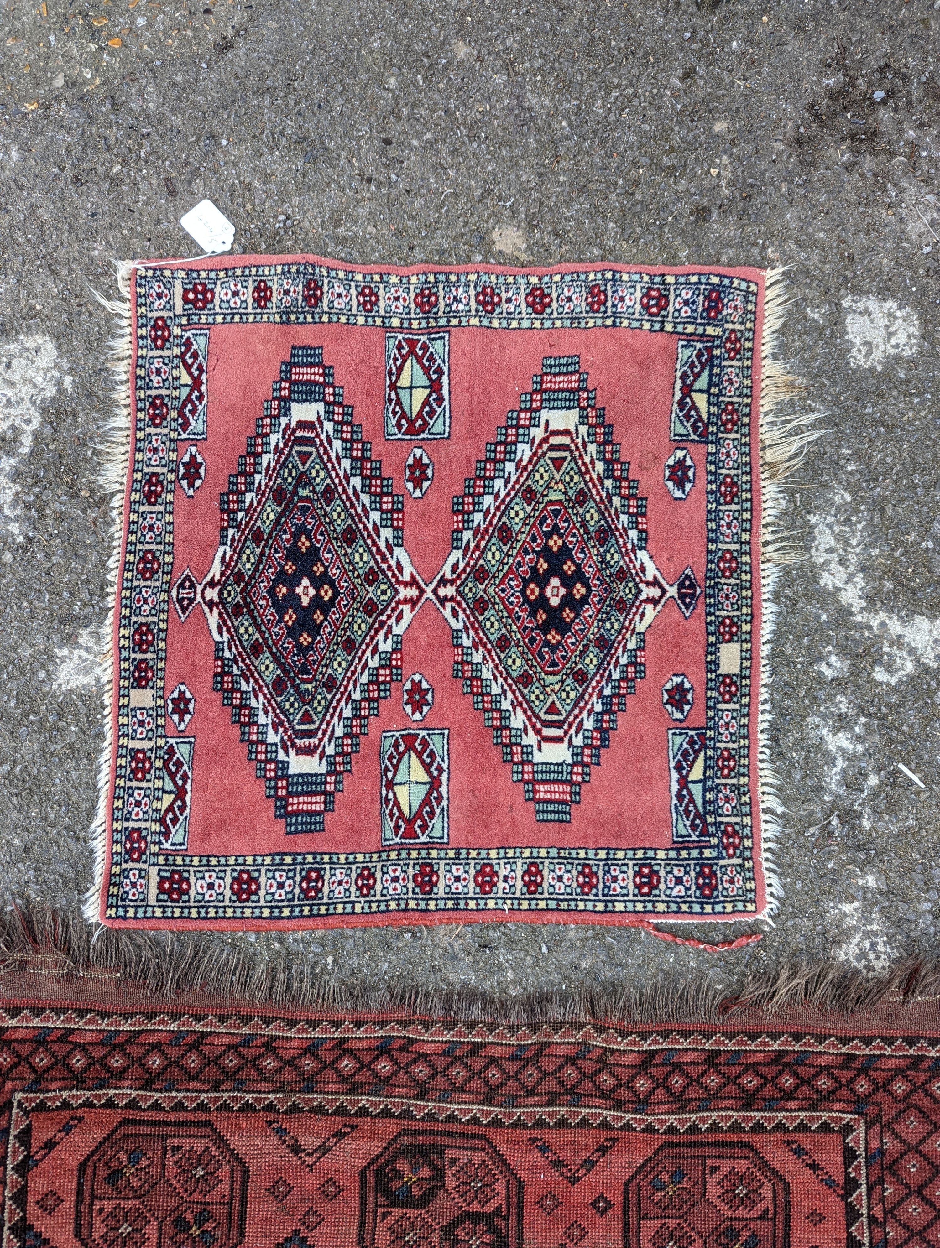 A North West Persian blue ground runner, 300 x 109 (worn and holed) a North West Persian rug, Bohara rug and mat